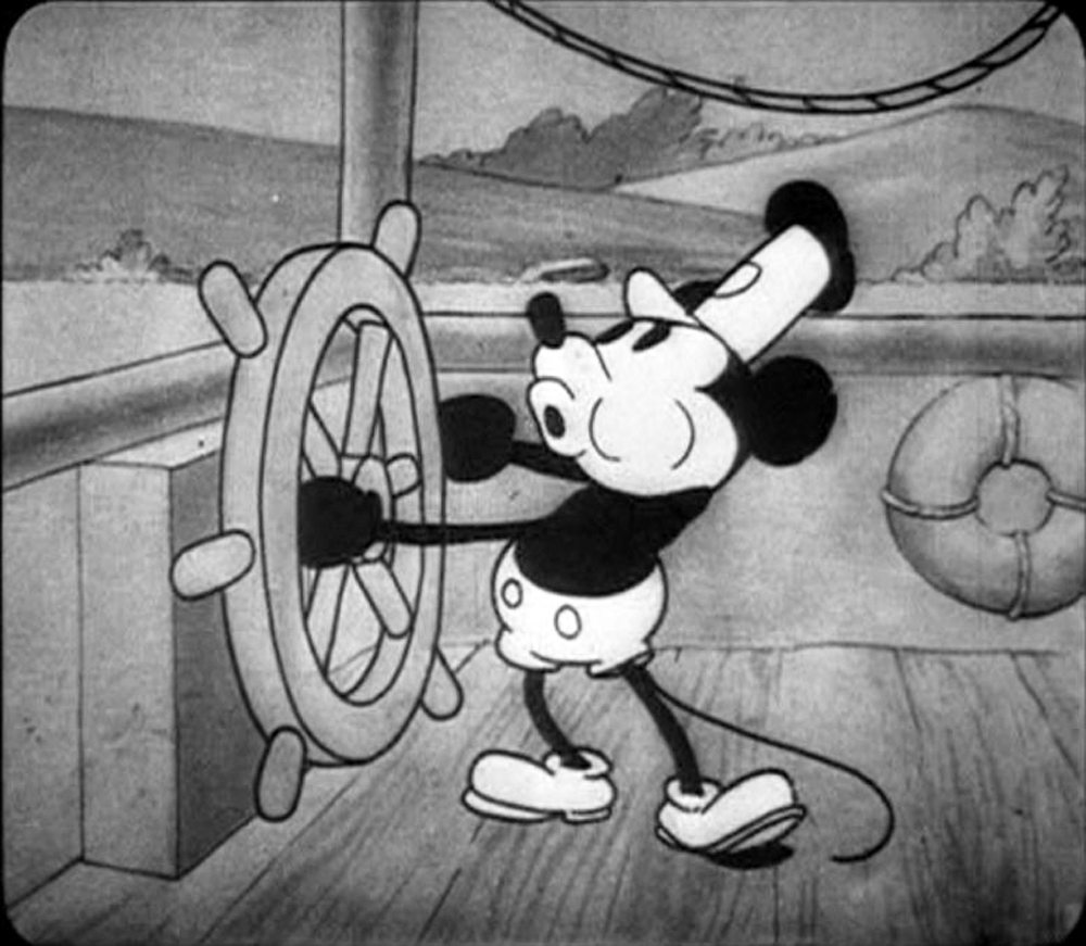 1928 Steamboat Willie-era Mickey Mouse at a ship wheel